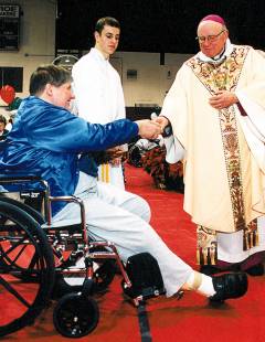 photo of Presentation of the Gifts at the Apostolate to the Handicapped's 34th consecutive Christmas Mass and party