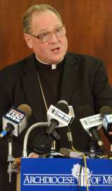 photo of new Milwaukee Archbishop Timothy M. Dolan addressing the media