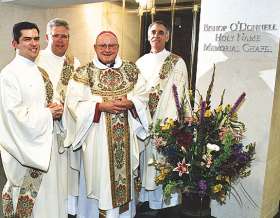 photo of Bishop Bullock and three deacons