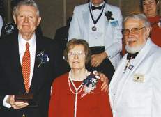 photo of award recipients Jack and Ann Rogan with Richard Rebman, right