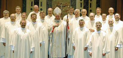 photo of Bishop Morlino with 20 new permanent deacons
