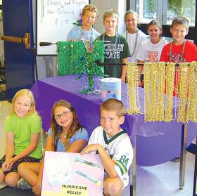 photo of students from Our Lady Queen of Peace School, Madison, who sold Mardi Gras beads to benefit victims of Hurricane Katrina