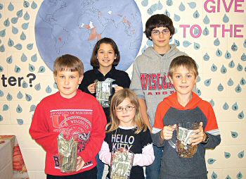 photo of five students at St. Joseph School in Fort Atkinson who helped raise $600 for a clean drinking water project from the University of Wisconsin-Madison and Water for Life