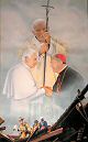 photo of painting by Fr. Gary Wankerl composed of images of Pope John Paul II, Pope Benedict XVI meeting with Bishop Morlino, and Madison firefighters rescuing the Blessed Sacrament from St. Raphael Cathedral after the March 2005 fire